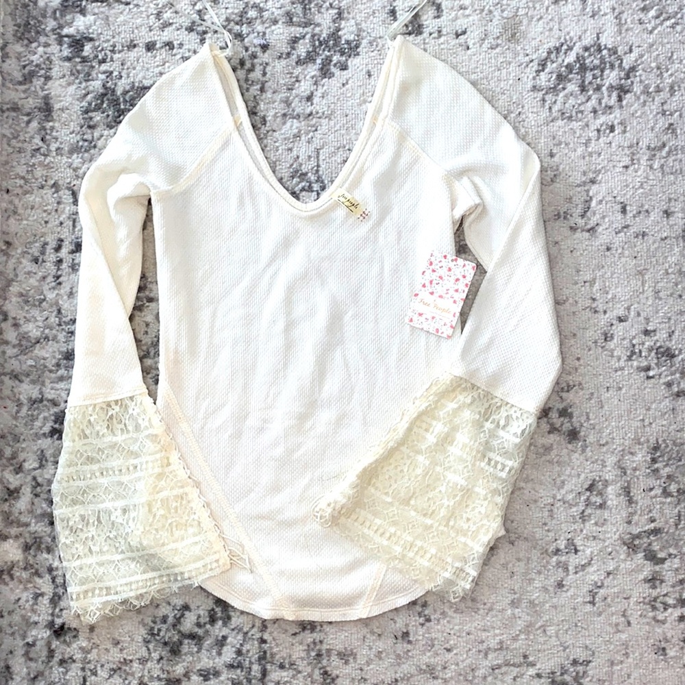 Free People thermal top with lace bell Sleeves. NWT sz S